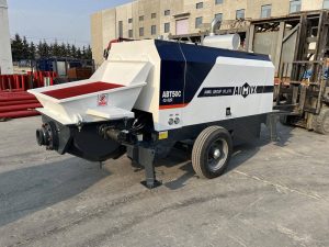 trailer concrete pump being checked before shipment